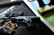 Handgun with ammunition (Image via Pixels)